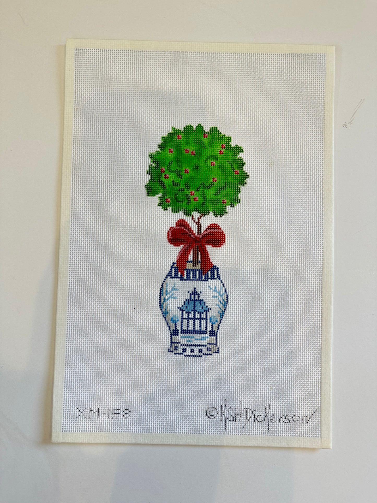Bush with Berries Pot with Red Bow